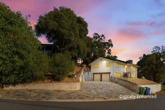 a house view with a garden space