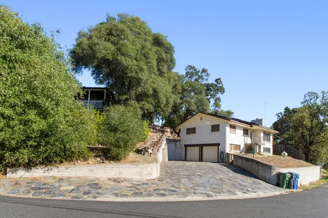 a house view with a outdoor space