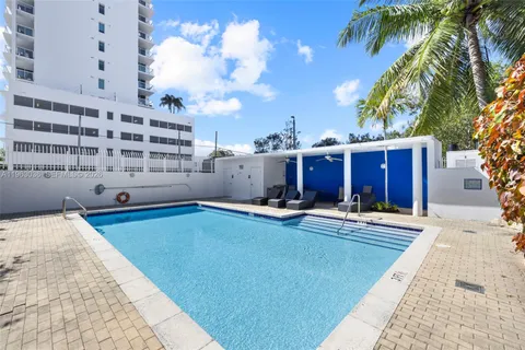a front view of a house with a large windows