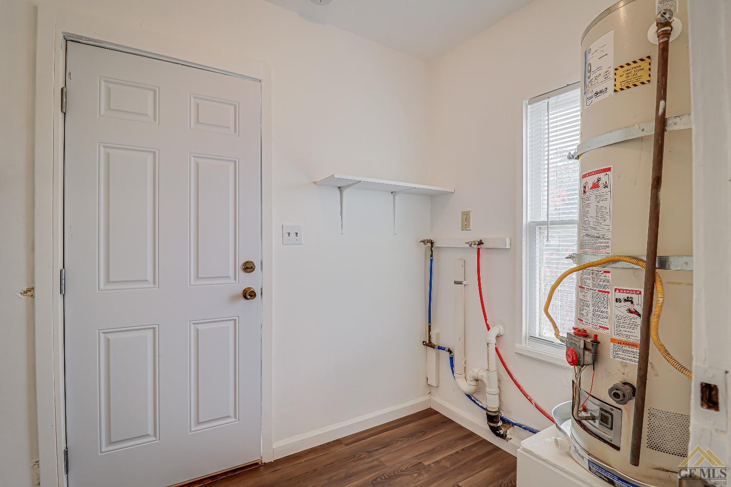 Undisclosed Address Bakersfield, CA 93308 - Photo 16 of 24 a view of an entryway with wooden floor
