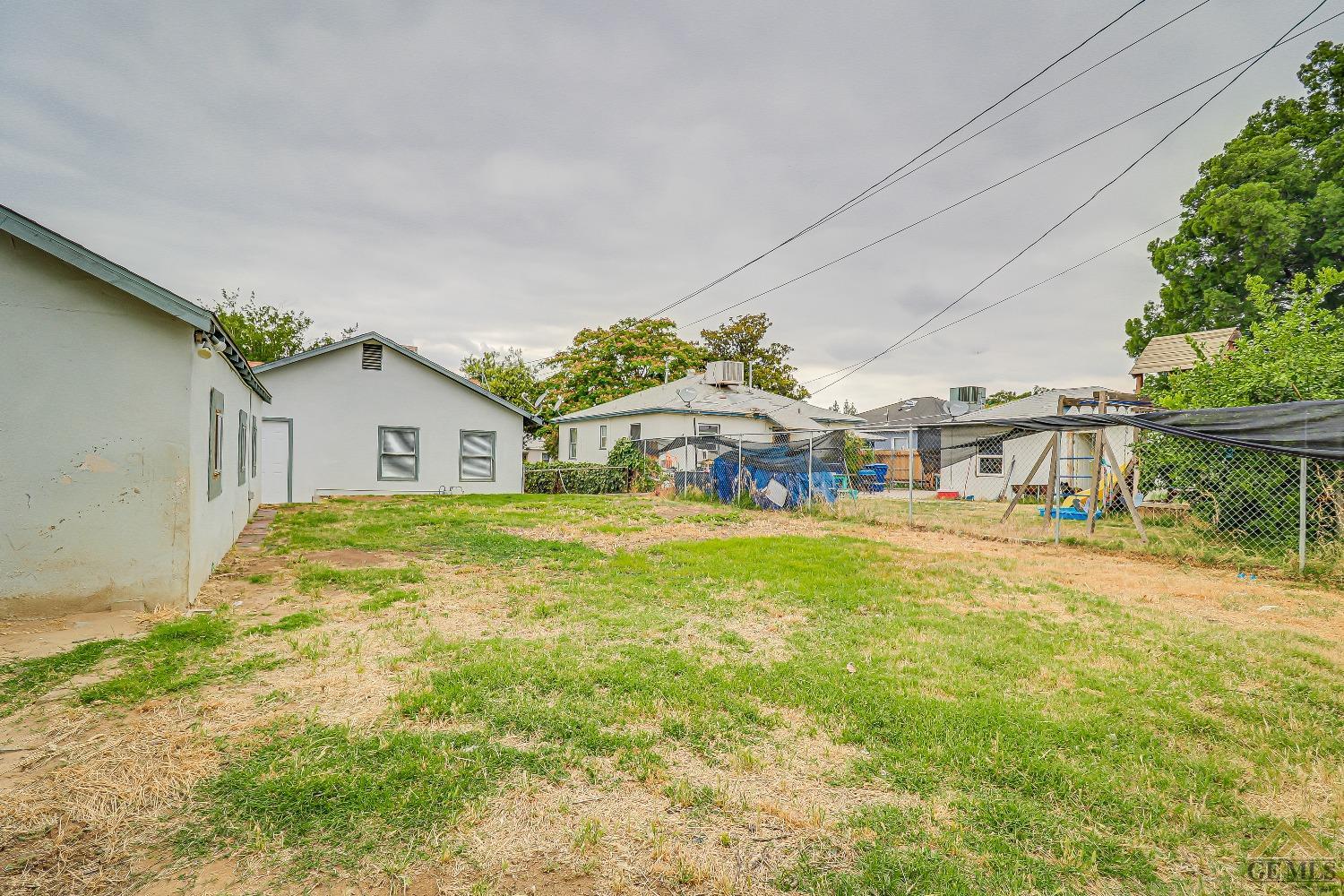 Undisclosed Address Bakersfield, CA 93308 - Photo 24 of 24 a house view with swimming pool in front of it