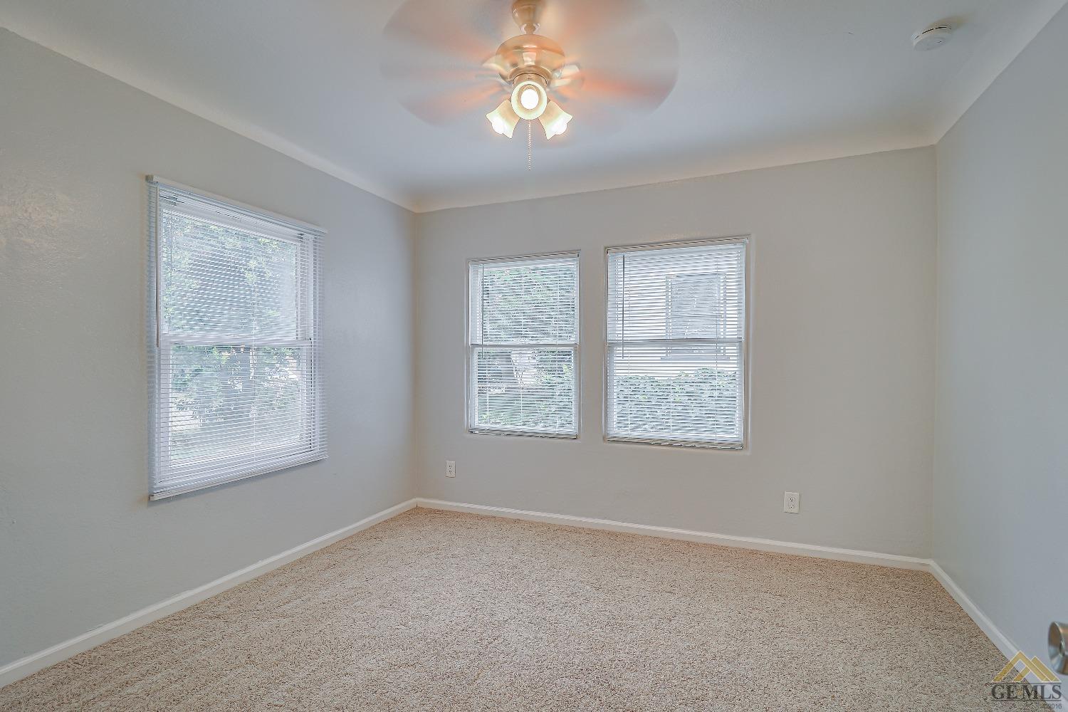 Undisclosed Address Bakersfield, CA 93308 - Photo 10 of 24 a view of an empty room with a window
