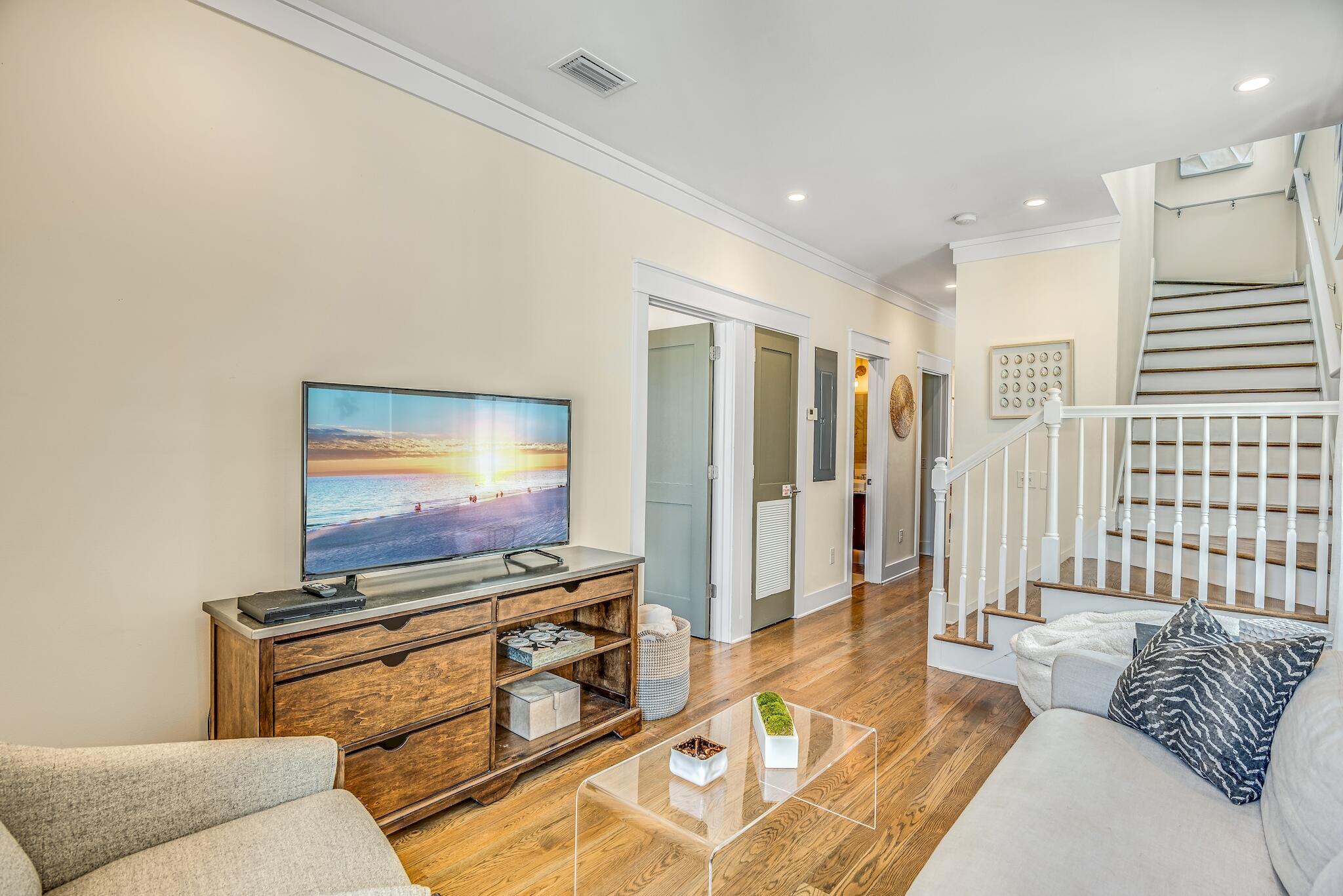 76 North Winston Ln Inlet Beach Inlet Beach, FL 32461 - Photo 15 of 48 a living room with furniture and a flat screen tv