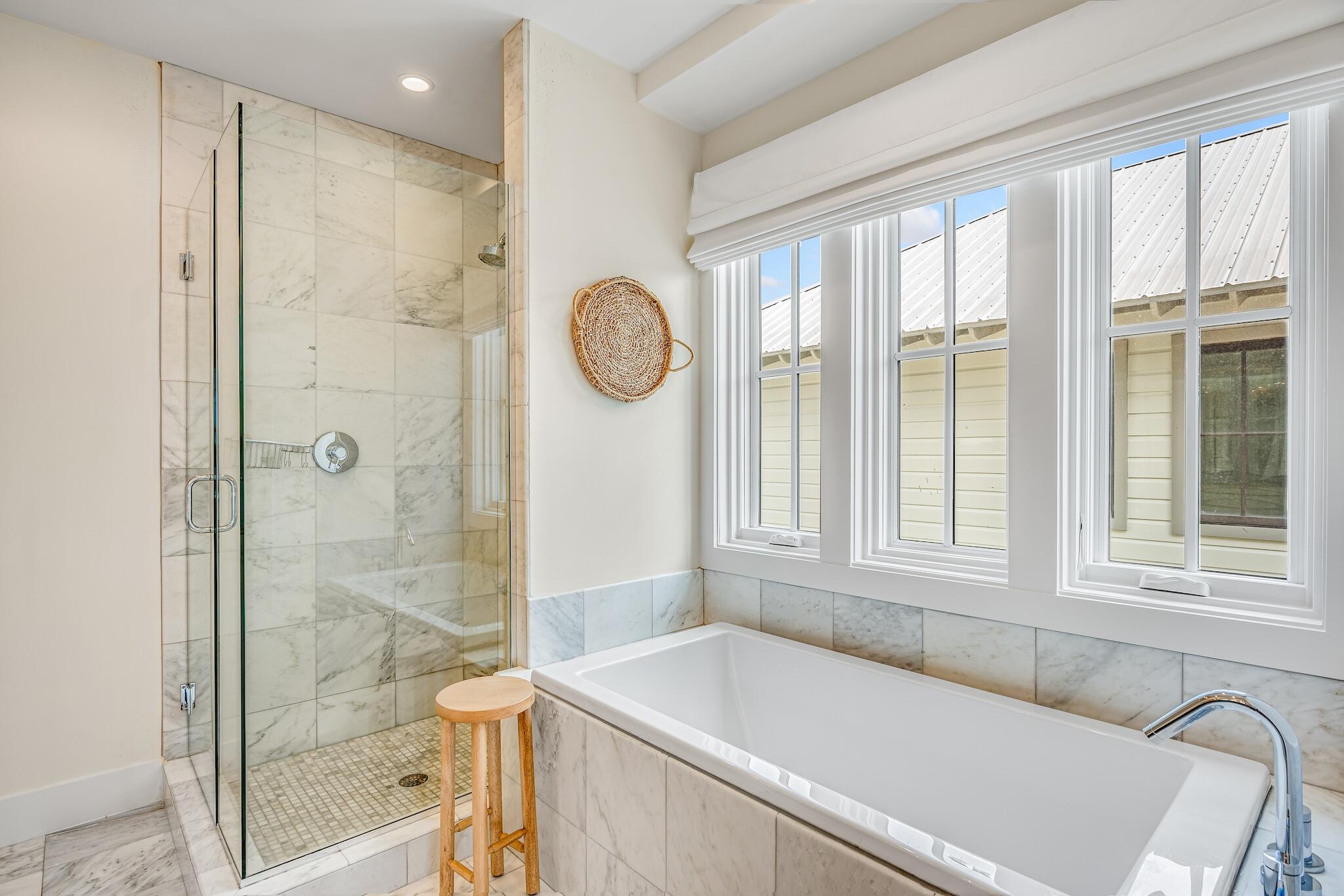76 North Winston Ln Inlet Beach Inlet Beach, FL 32461 - Photo 26 of 48 a bathroom with a bathtub and a shower