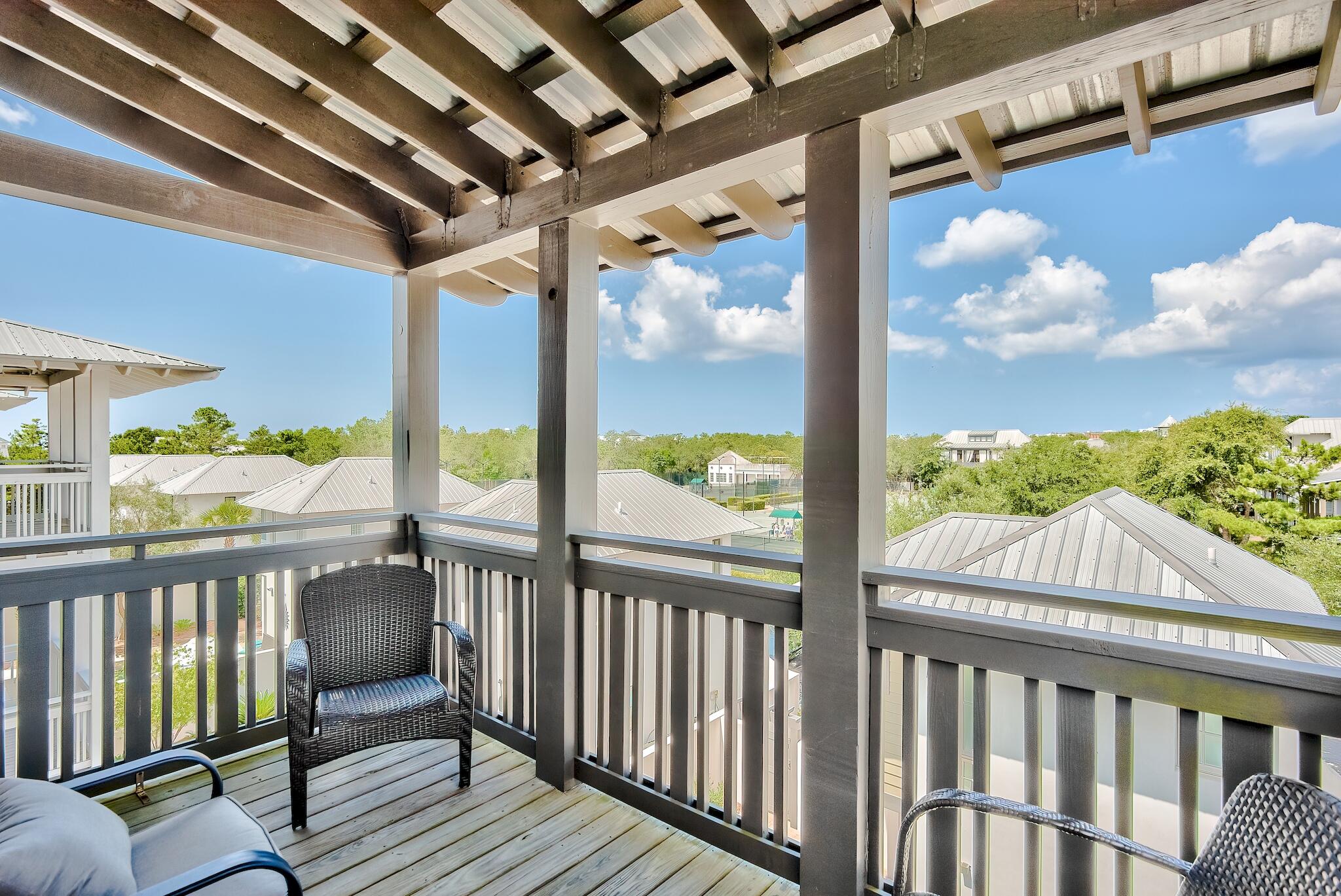 76 North Winston Ln Inlet Beach Inlet Beach, FL 32461 - Photo 32 of 48 a view of a porch with wooden floor