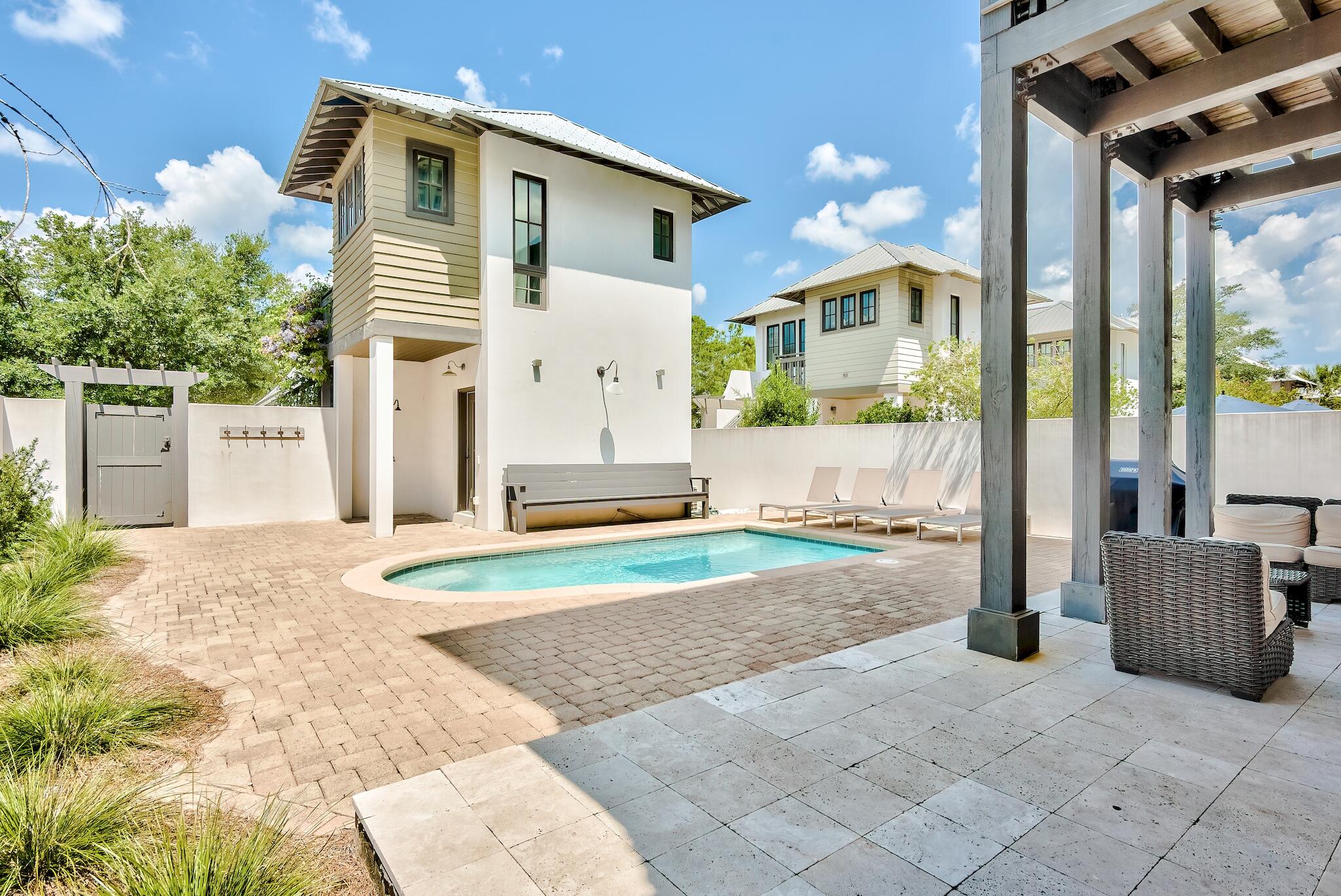 76 North Winston Ln Inlet Beach Inlet Beach, FL 32461 - Photo 39 of 48 a front view of a house with a yard