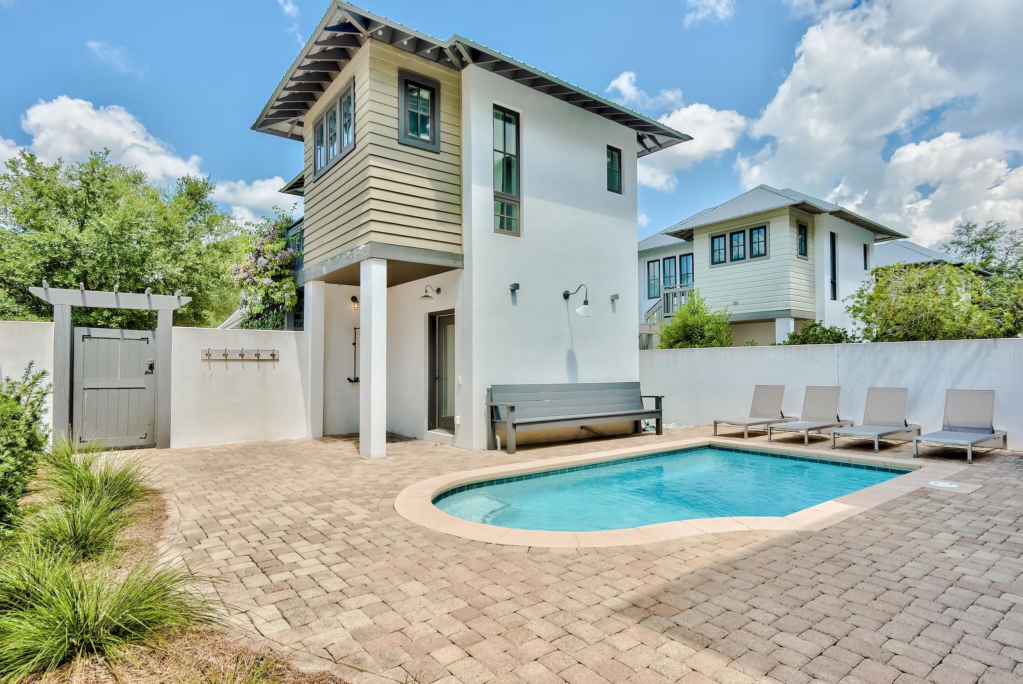 76 North Winston Ln Inlet Beach Inlet Beach, FL 32461 - Photo 43 of 48 a front view of a house with a yard