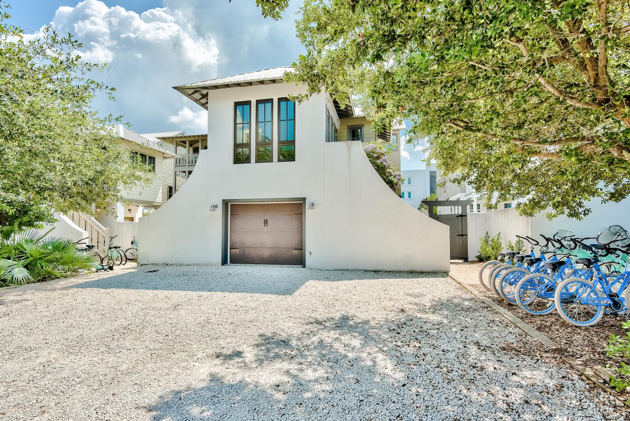 76 North Winston Ln Inlet Beach Inlet Beach, FL 32461 - Photo 47 of 48 a front view of a house with a yard