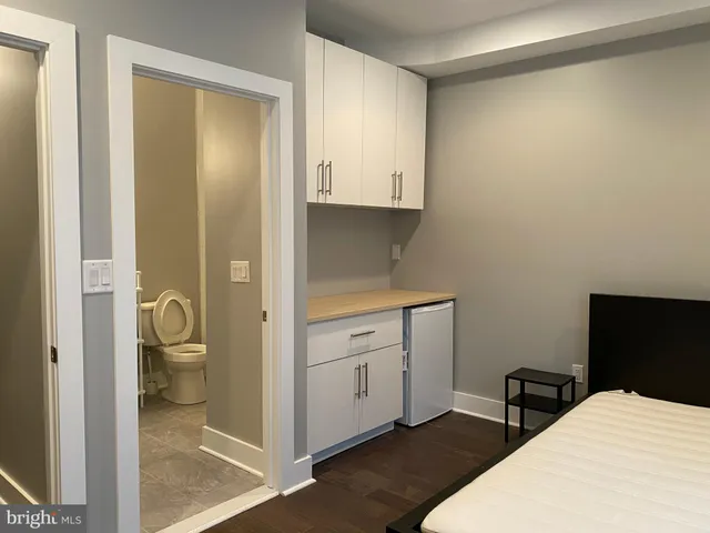 a bathroom with a toilet sink and bathtub