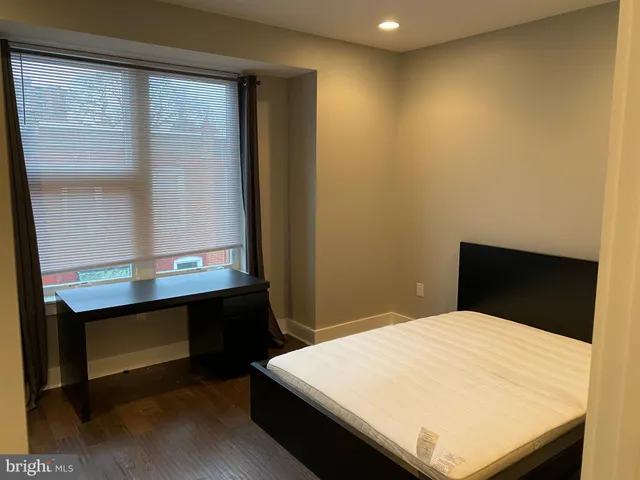 a room with a table and chairs