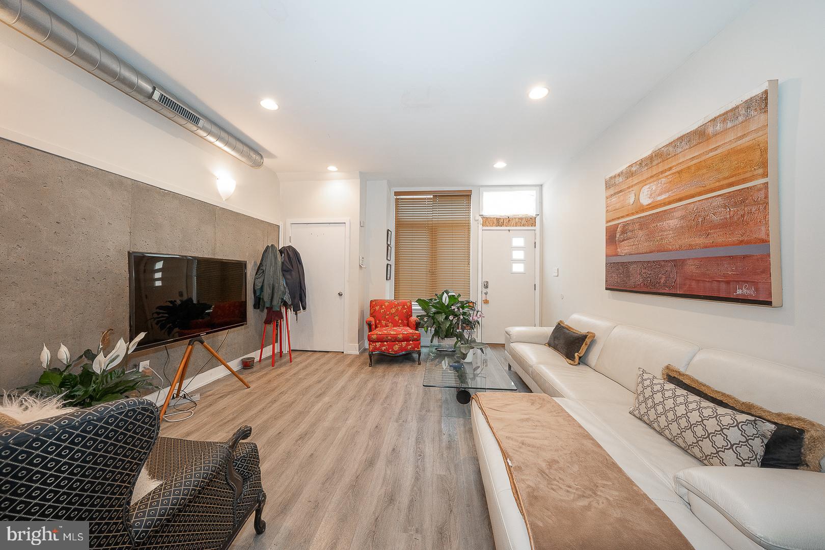 715 Shirley Street, Unit A Philadelphia, PA 19130 - Photo 5 of 24 a living room with furniture and wooden floor