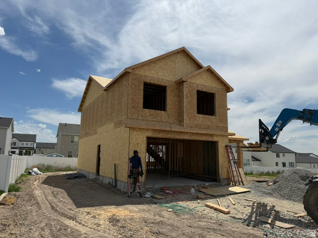 250 West 550 North Smithfield, UT 84335 - Photo 2 of 8 New construction home in framing stage featuring a two-story design and attached garage
