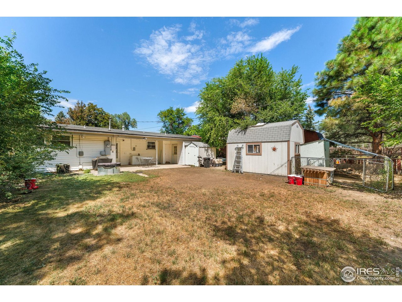 7908 Stuart Place Westminster, CO 80030 - Photo 22 of 30 a house view with a backyard space