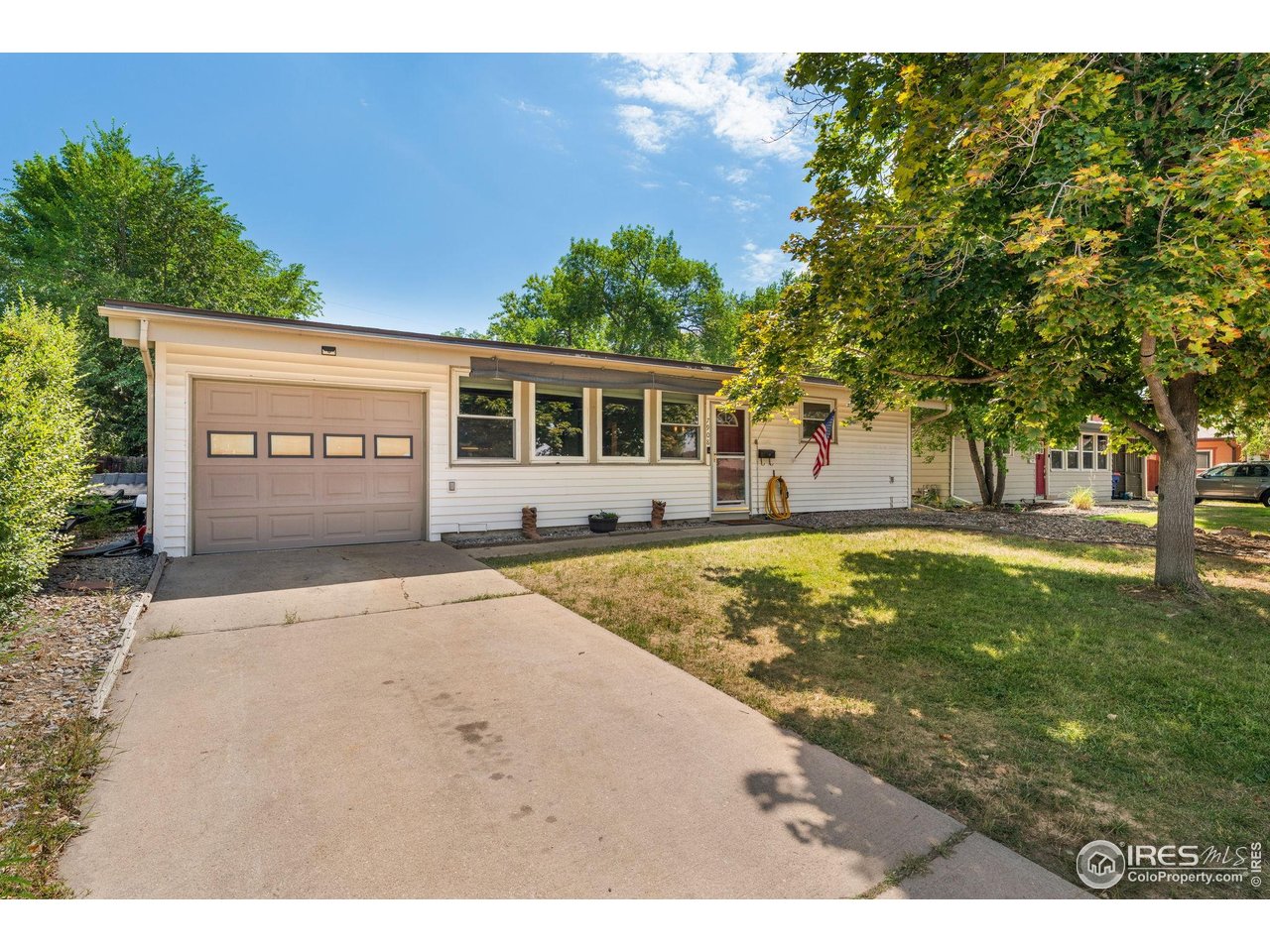 7908 Stuart Place Westminster, CO 80030 - Photo 4 of 30 a view of a house with a yard