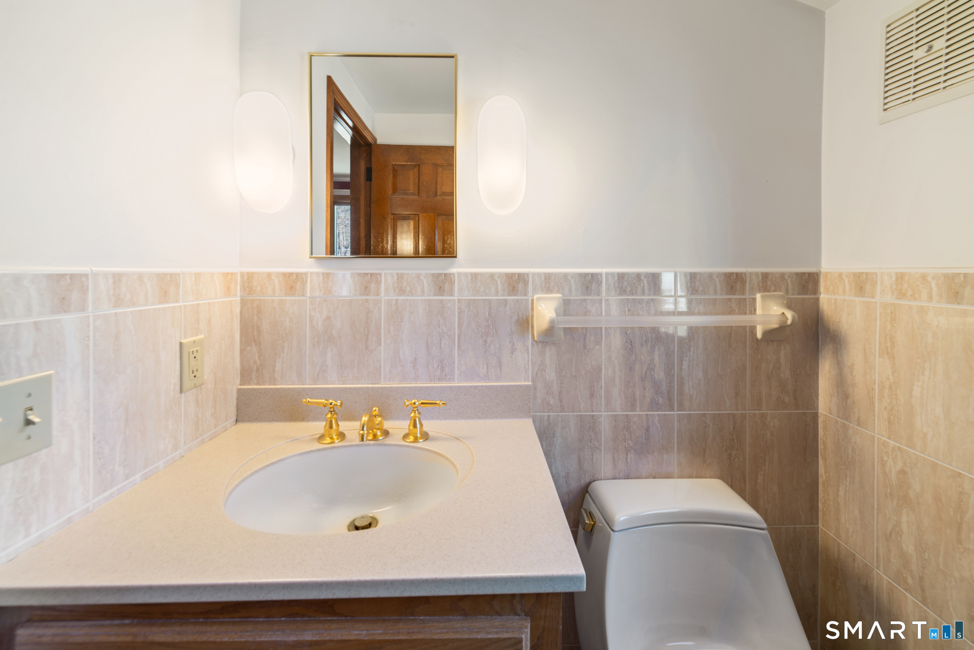 91 Gleeson Road Middletown, CT 06457 - Photo 18 of 39 a bathroom with a sink and a bathtub