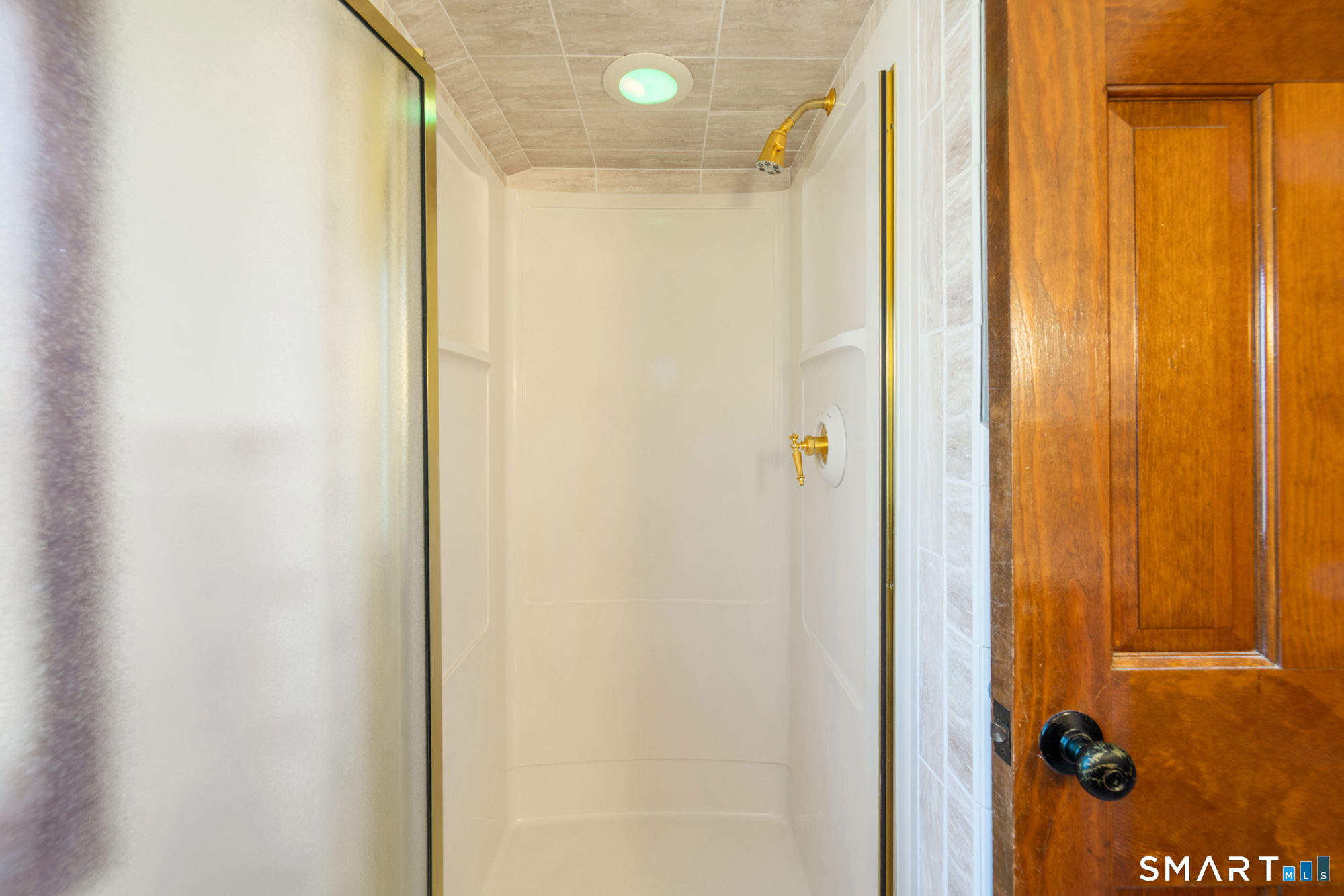 91 Gleeson Road Middletown, CT 06457 - Photo 20 of 39 a bathroom with a shower and a shower