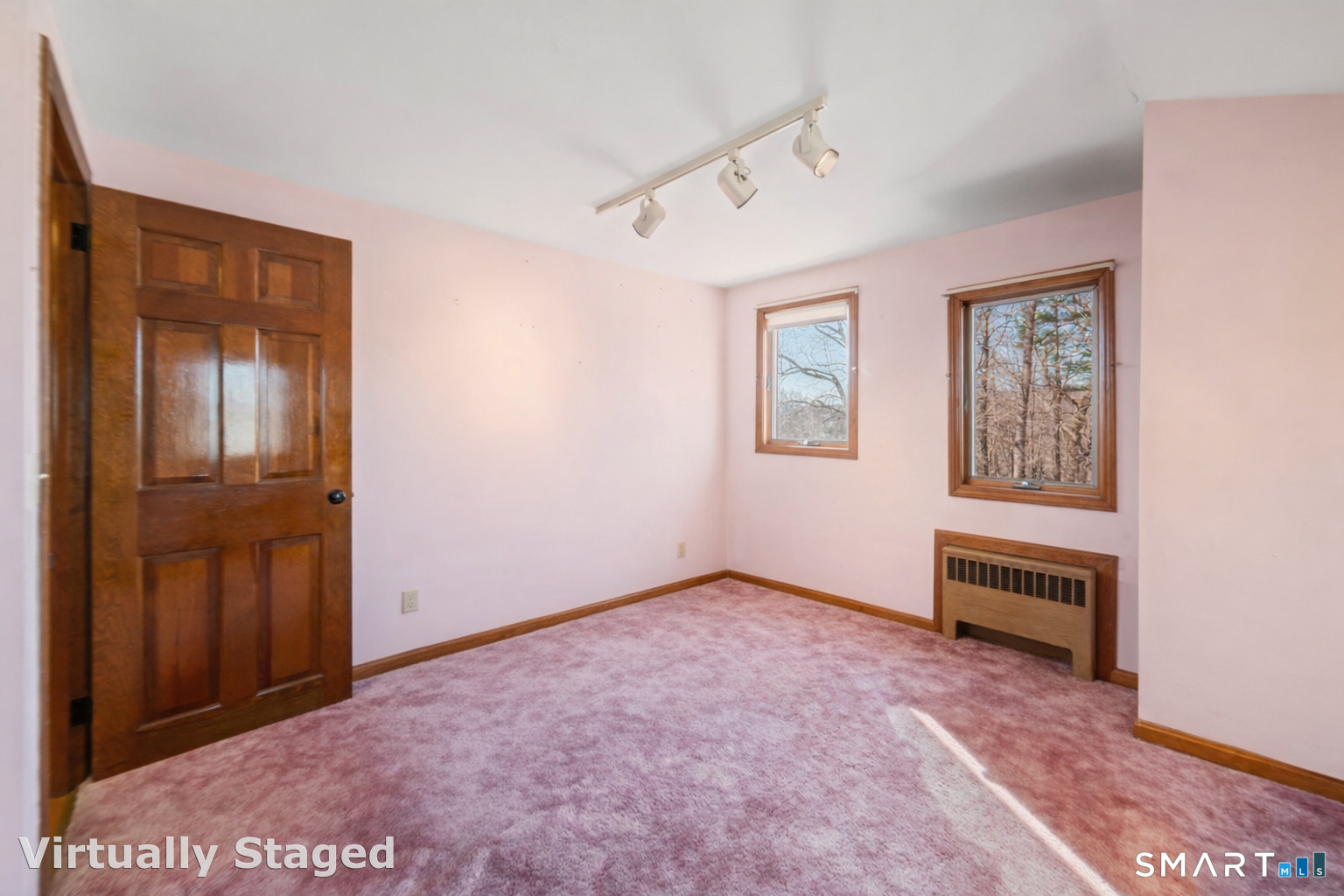 91 Gleeson Road Middletown, CT 06457 - Photo 22 of 39 an empty room with windows and closet