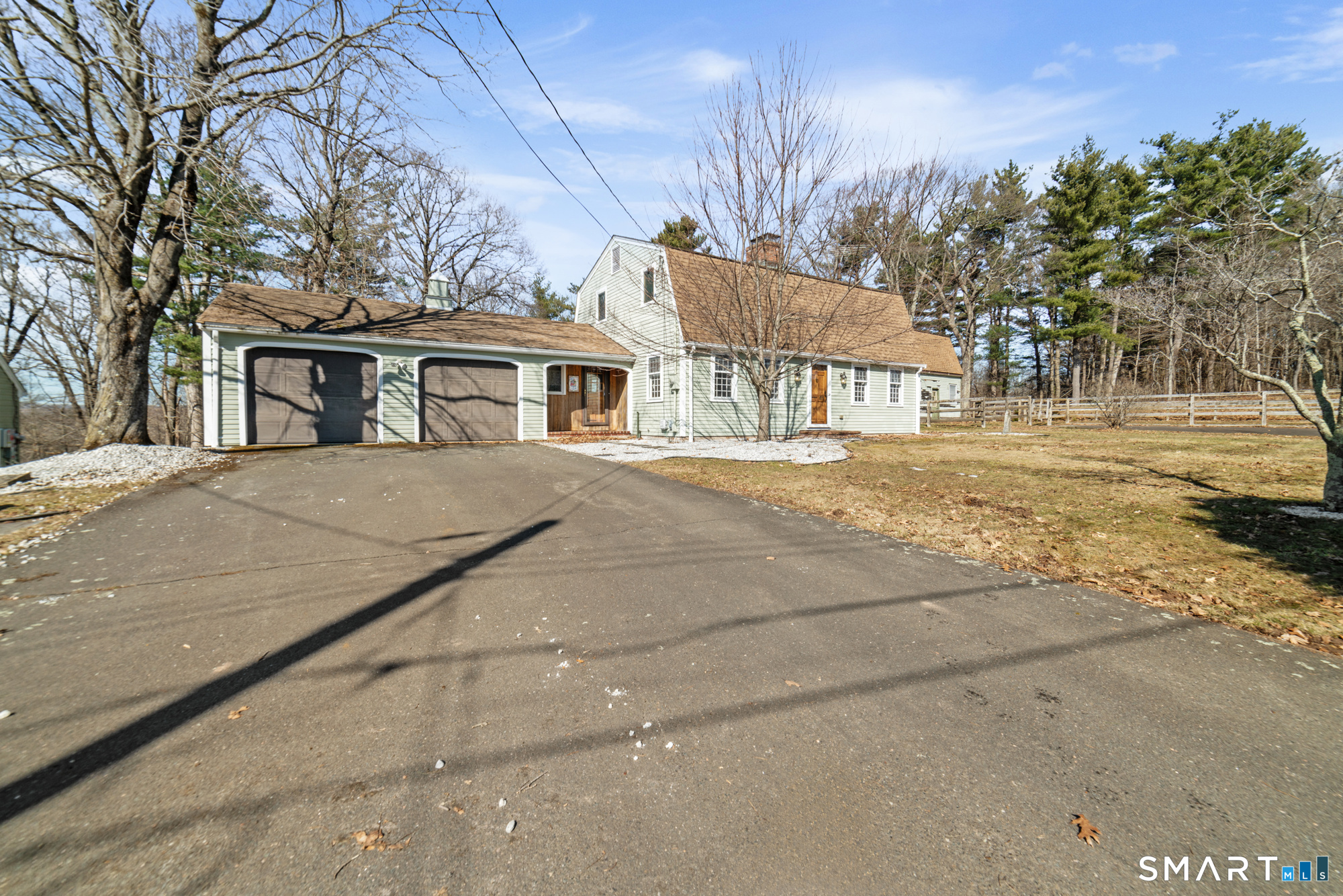 91 Gleeson Road Middletown, CT 06457 - Photo 35 of 39 a front view of house with yard and trees around
