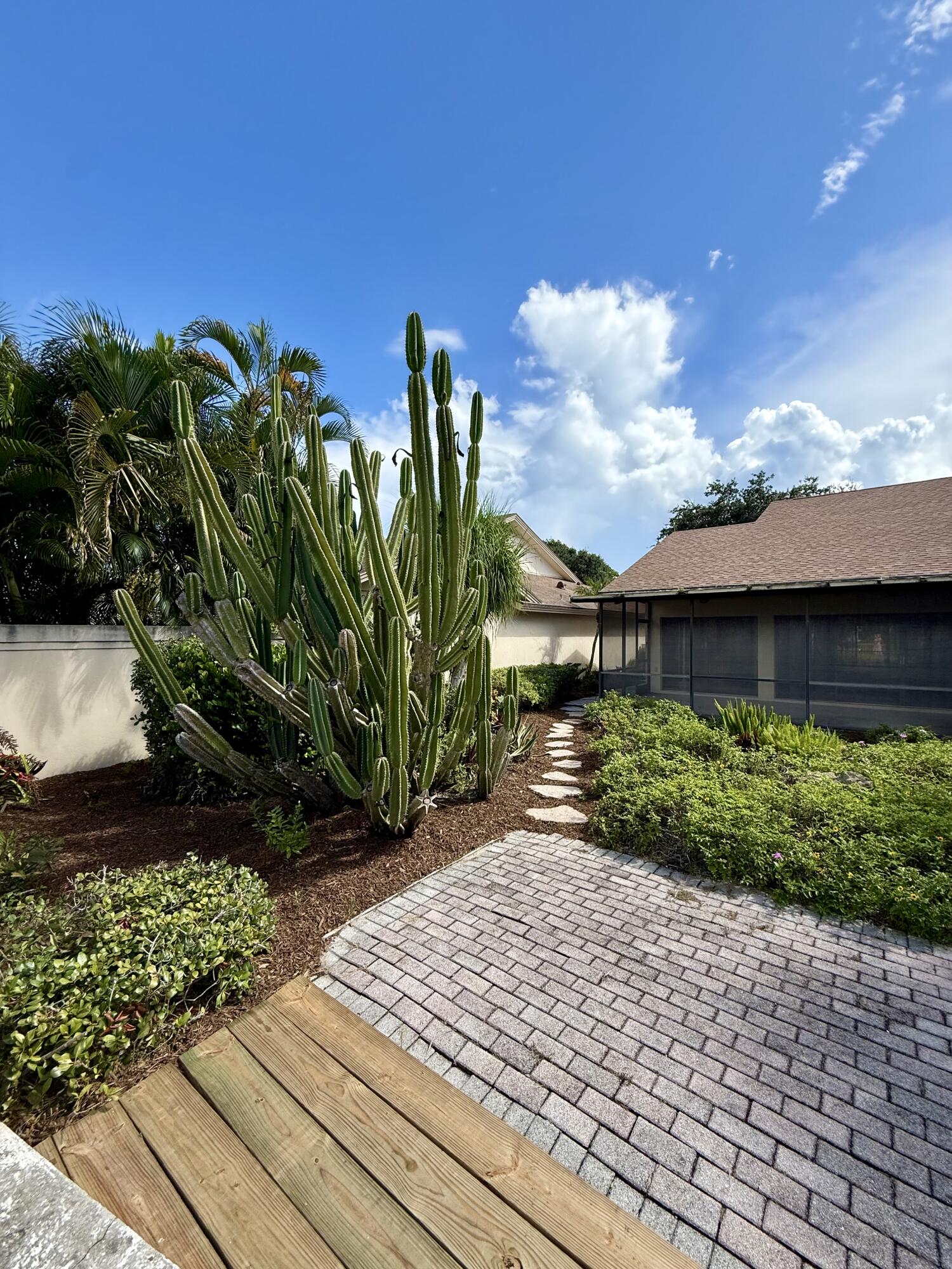 348 River Edge Road Jupiter, FL 33477 - Photo 18 of 30 a view of a backyard