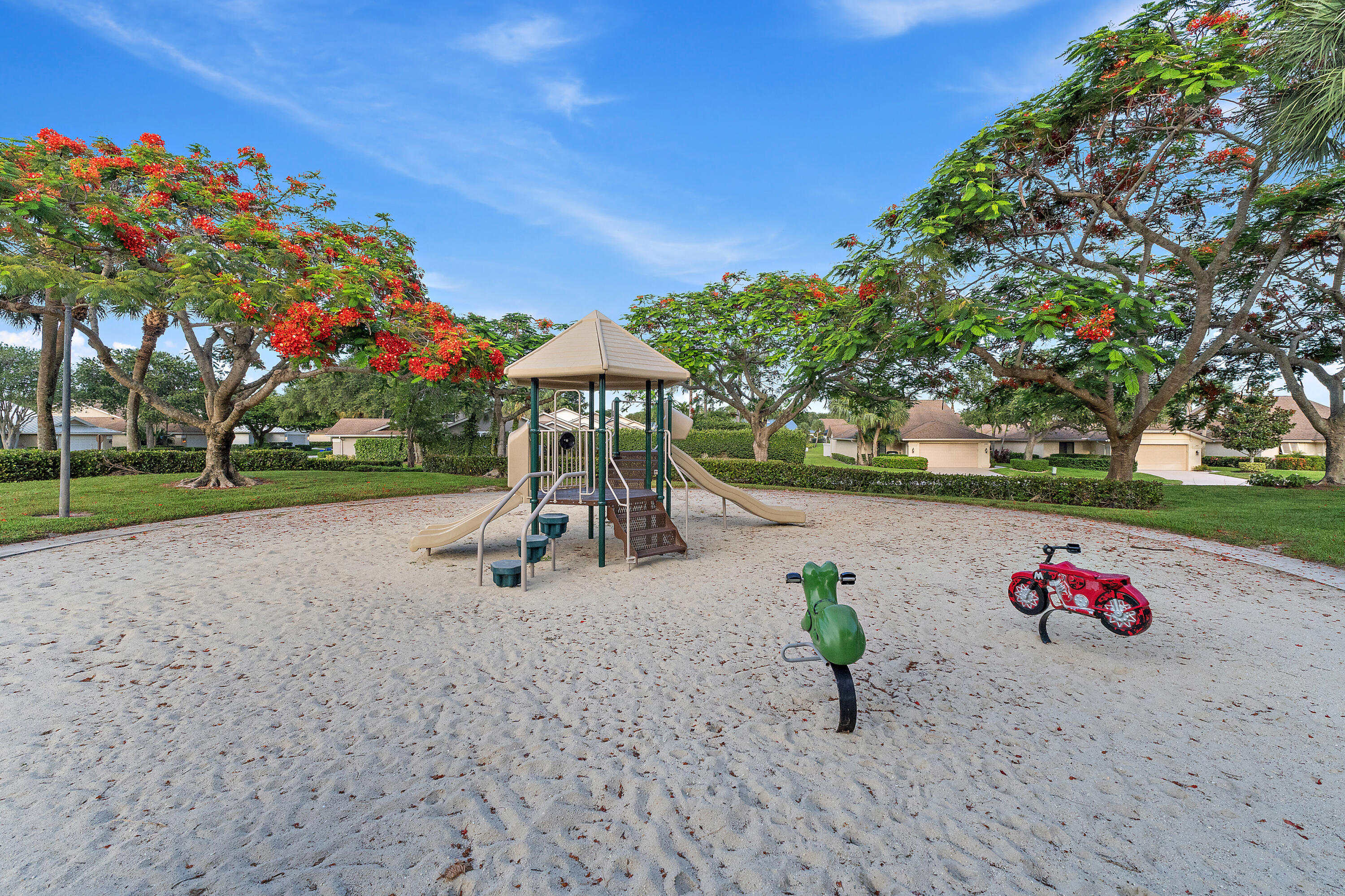 348 River Edge Road Jupiter, FL 33477 - Photo 24 of 30 a park view with a sitting space