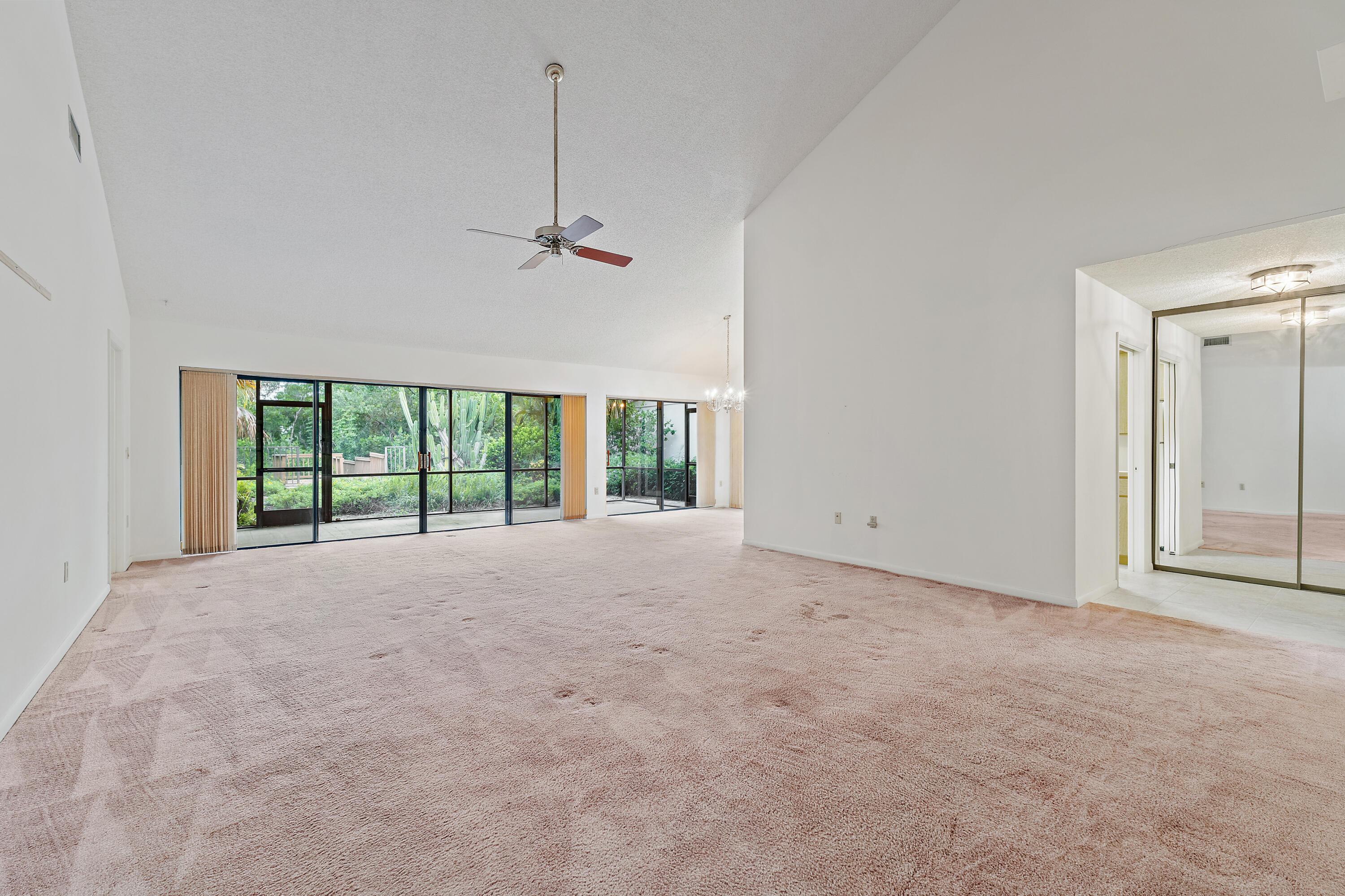 348 River Edge Road Jupiter, FL 33477 - Photo 9 of 30 a view of an empty room with a window