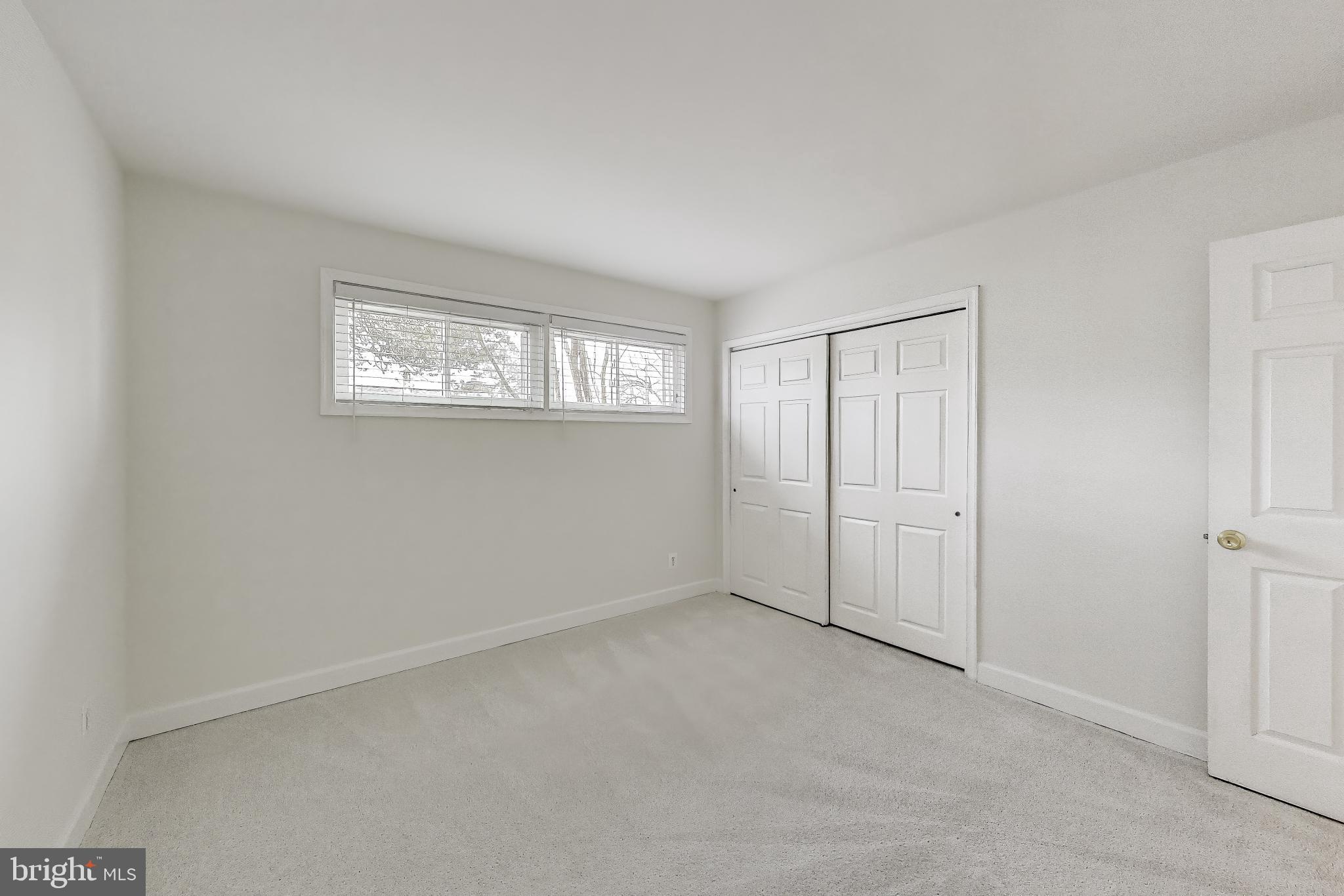 7402 Inzer Street Springfield, VA 22151 - Photo 14 of 49 Primary Bedroom with Fresh Neutral Paint