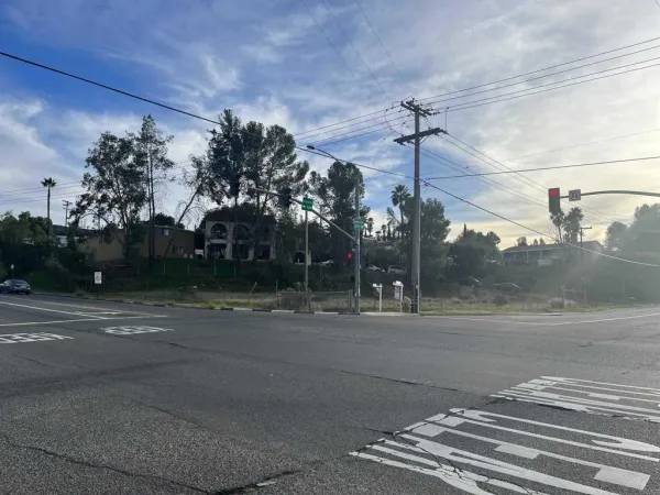 a view of a house with a street
