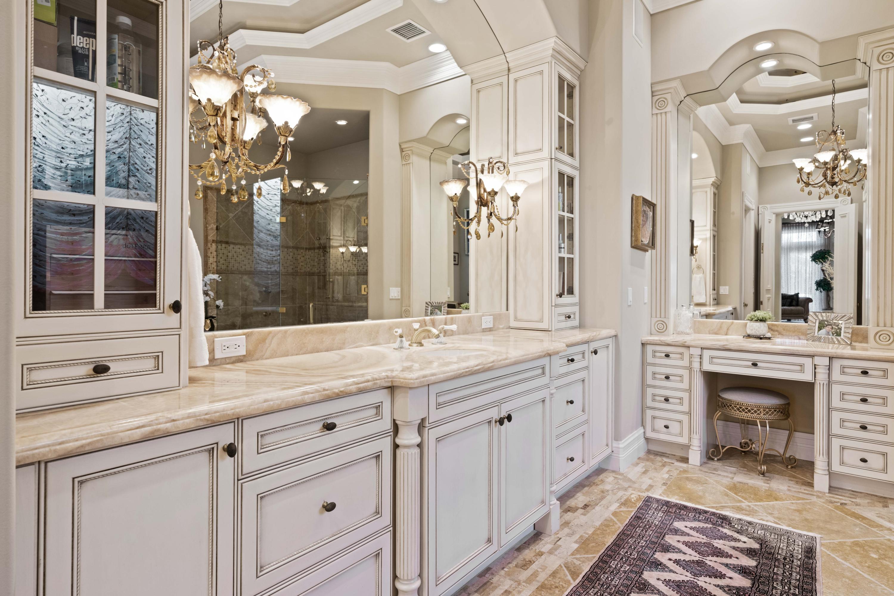 387 Eagle Drive Jupiter, FL 33477 - Photo 27 of 77 Custom Cabinetry & Marble Vanity Tops