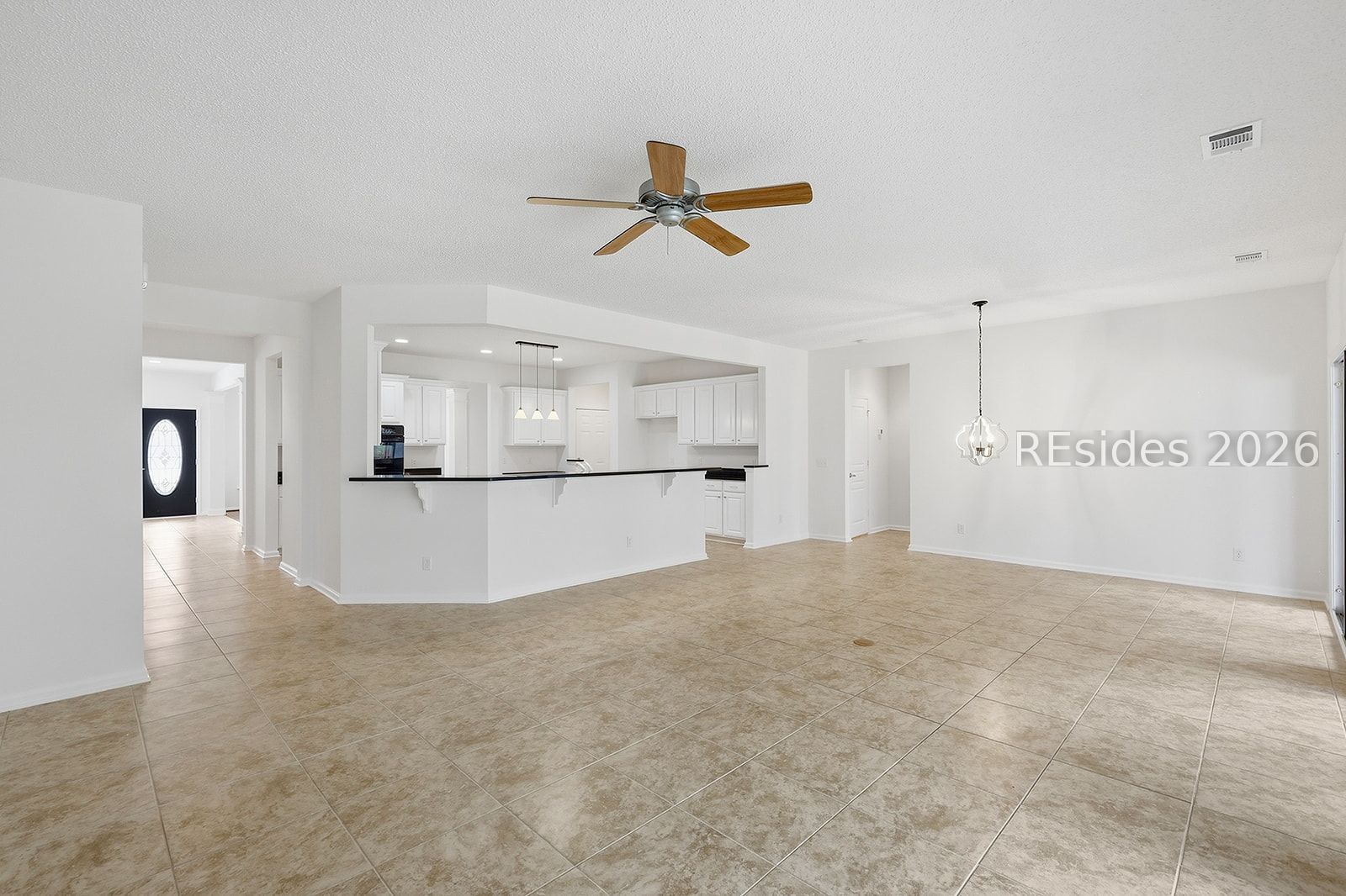 108 Landing Lane Bluffton, SC 29909 - Photo 23 of 63 View from living area to the kitchen