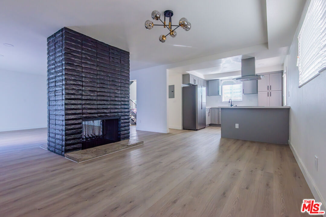 1303 Beryl Street Redondo Beach, CA 90277 - Photo 20 of 31 a view of a kitchen with a sink and a stove top oven