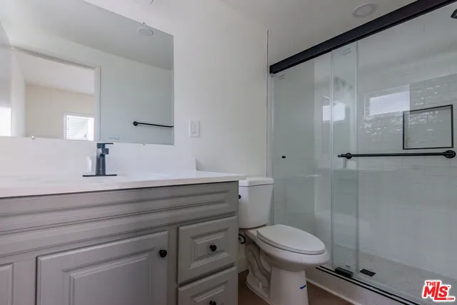 a view of a hallway with washer and dryer