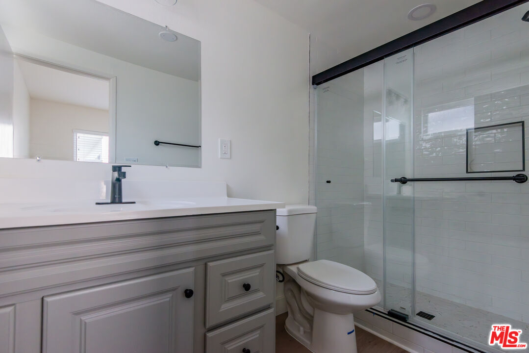 1303 Beryl Street Redondo Beach, CA 90277 - Photo 24 of 31 a bathroom with a sink a toilet and shower