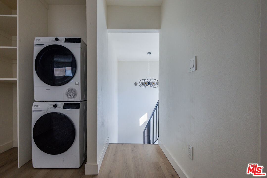 1303 Beryl Street Redondo Beach, CA 90277 - Photo 25 of 31 a view of a hallway with washer and dryer