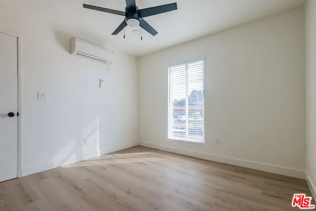 a view of a kitchen with a sink cabinets and a window