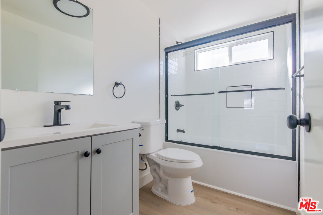 1303 Beryl Street Redondo Beach, CA 90277 - Photo 29 of 31 a bathroom with a toilet sink and shower