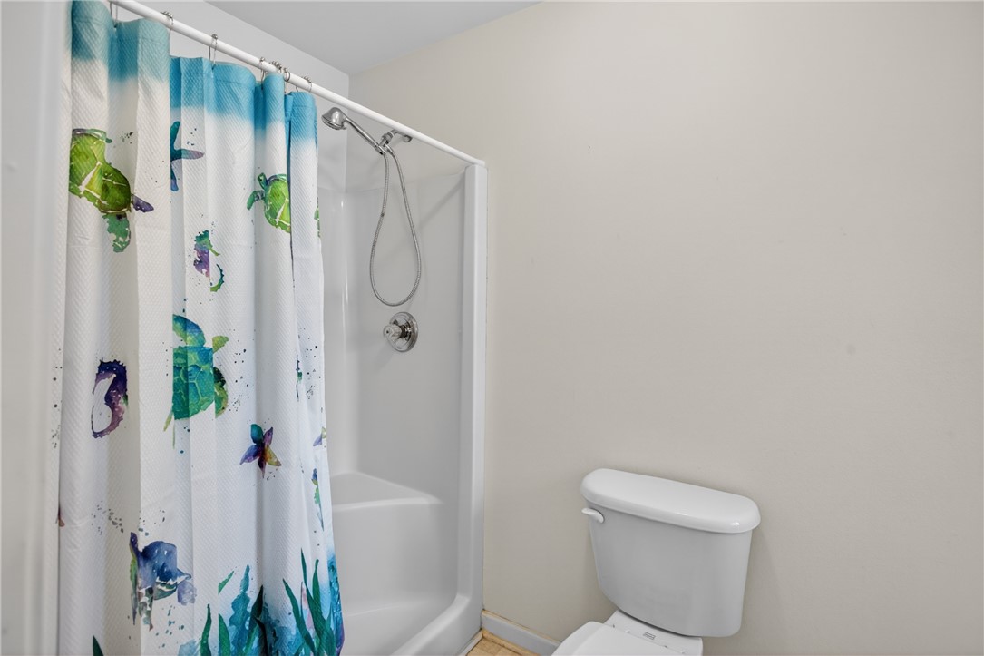 207 Hunters Lane Anderson, SC 29625 - Photo 24 of 46 A well-maintained full bathroom offers a convenient shower and separate soaking tub and essential amenities.