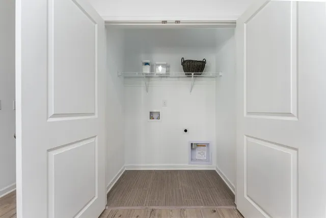 a view of walk in closet with window