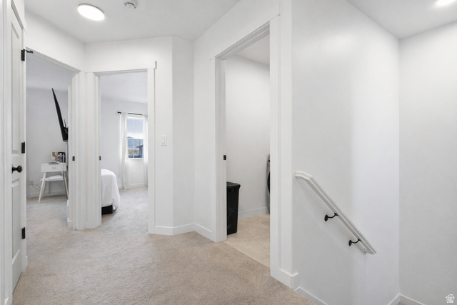 3473 Hardman Way Lehi, UT 84048 - Photo 18 of 22 Corridor featuring an upstairs landing, light carpet, and recessed lighting