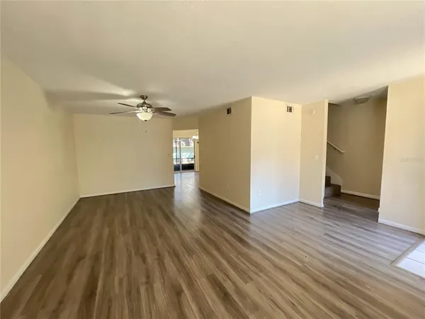 a kitchen with cabinets and appliances