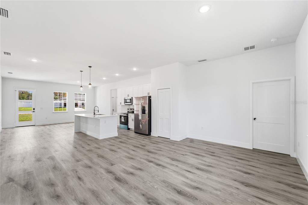 2600 Southwest 146th Pl Road Ocala, FL 34473 - Photo 13 of 40 a view of kitchen with wooden floor