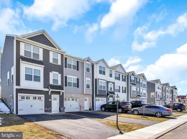 a city street lined with tall buildings