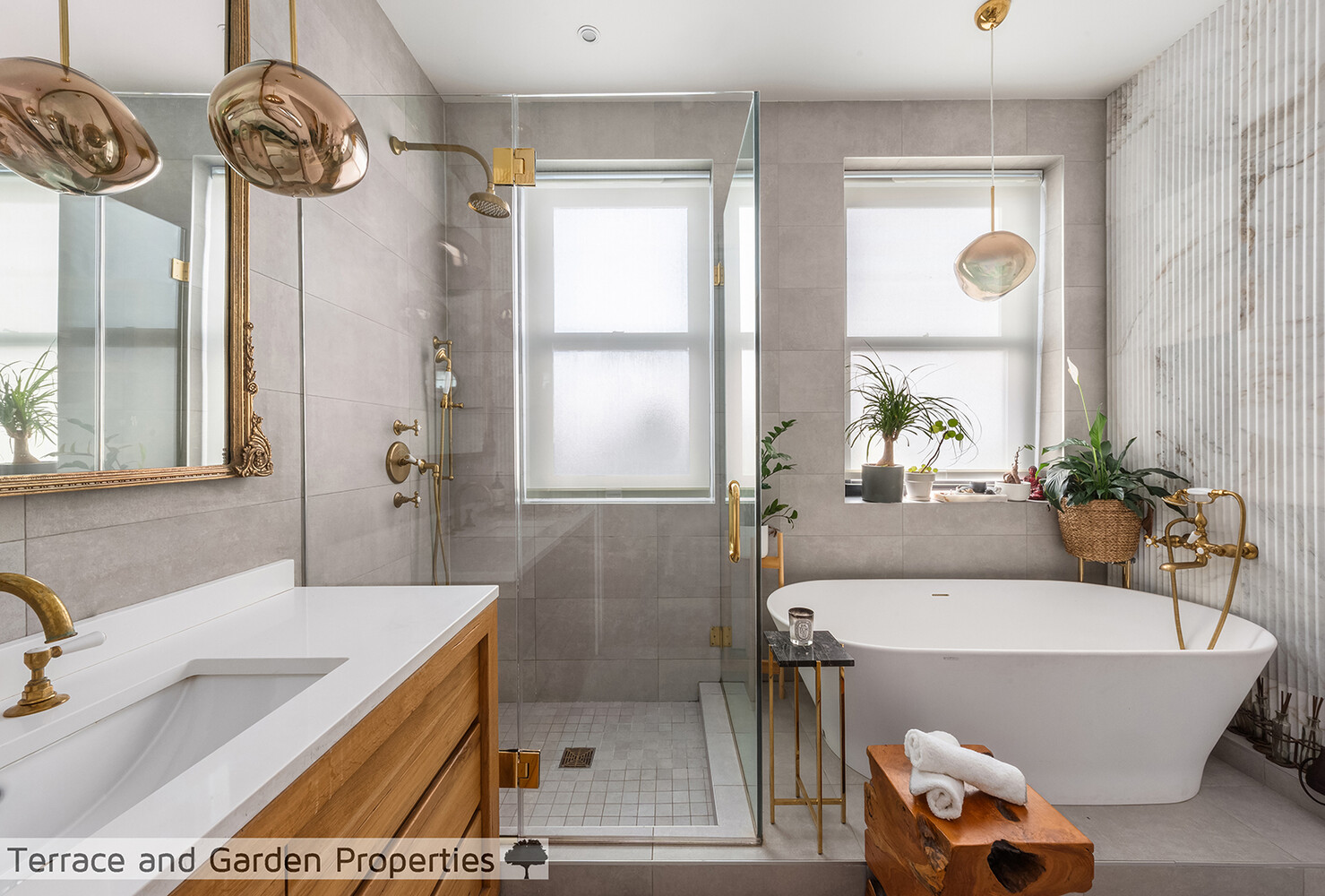 25 Broad Street, Unit PH2D Manhattan, NY 10004 - Photo 15 of 21 a bathroom with a tub a sink and a window