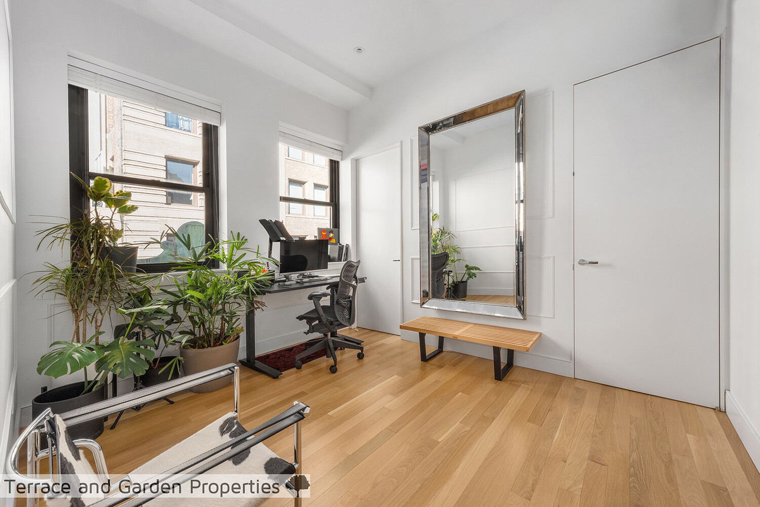 25 Broad Street, Unit PH2D Manhattan, NY 10004 - Photo 16 of 21 a room with furniture and a window