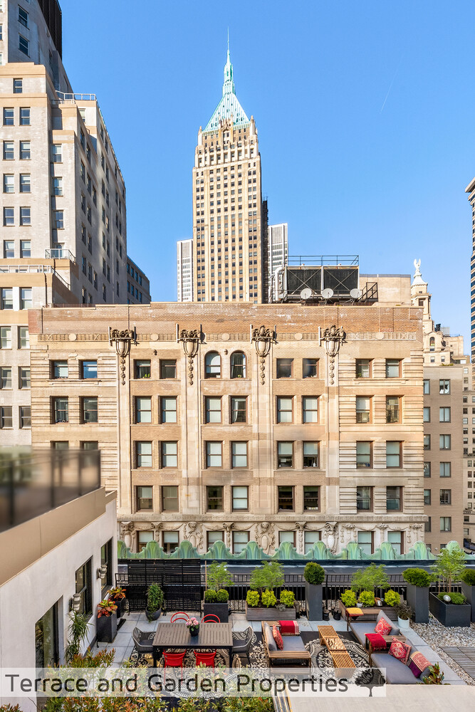 25 Broad Street, Unit PH2D Manhattan, NY 10004 - Photo 19 of 21 a front view of a building with street view