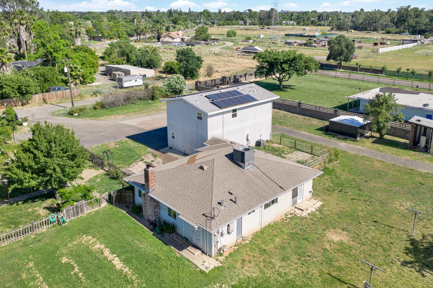6515 West 4th Street Rio Linda, CA 95673 - Photo 77 of 97 an aerial view of a house with a garden and mountain view