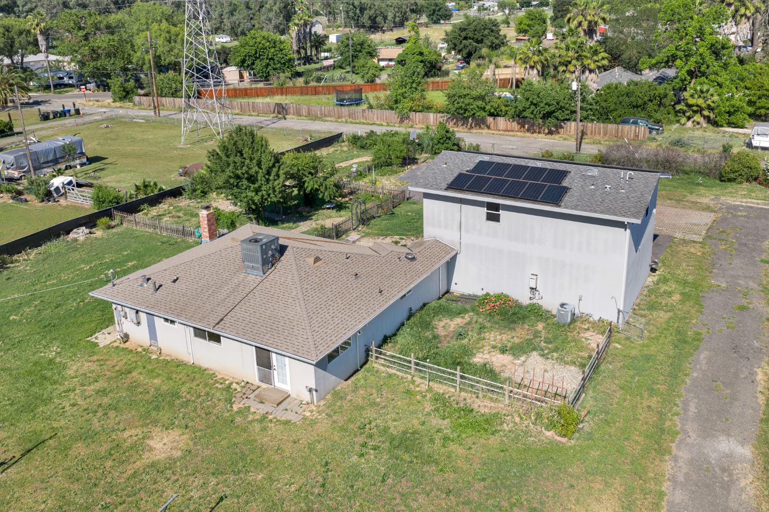 6515 West 4th Street Rio Linda, CA 95673 - Photo 97 of 97 an aerial view of a house with a yard and lake view