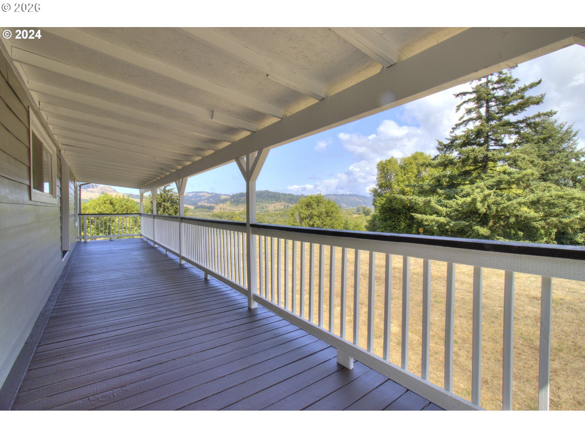 95171 Vista Loop Gold Beach, OR 97444 - Photo 19 of 35 a view of balcony with wooden floor