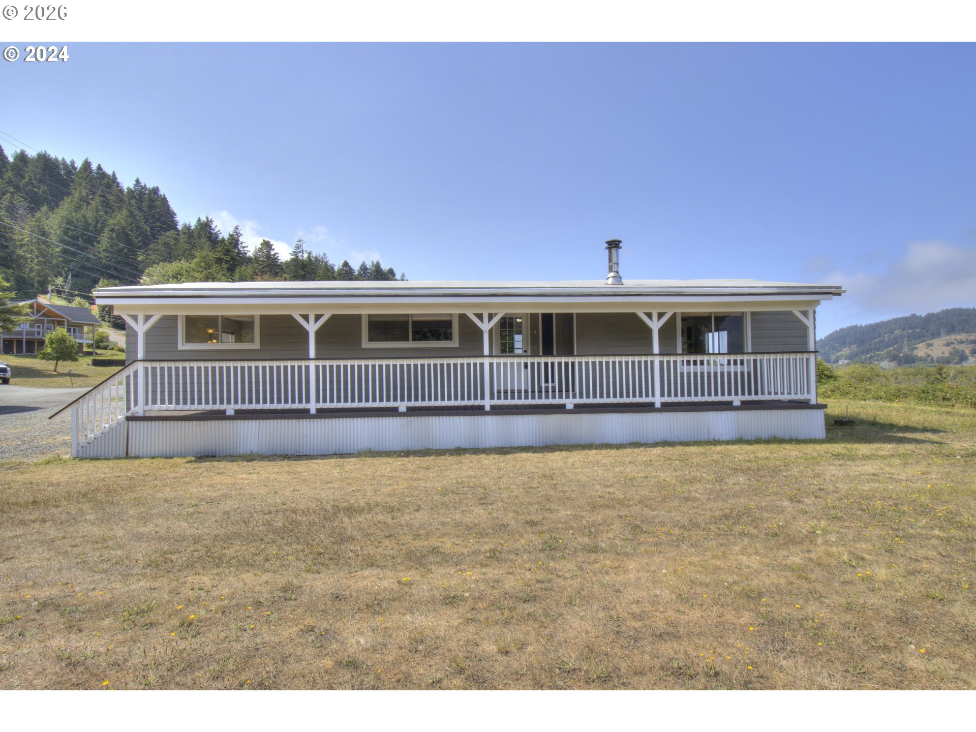 95171 Vista Loop Gold Beach, OR 97444 - Photo 31 of 35 a view of house with front yard