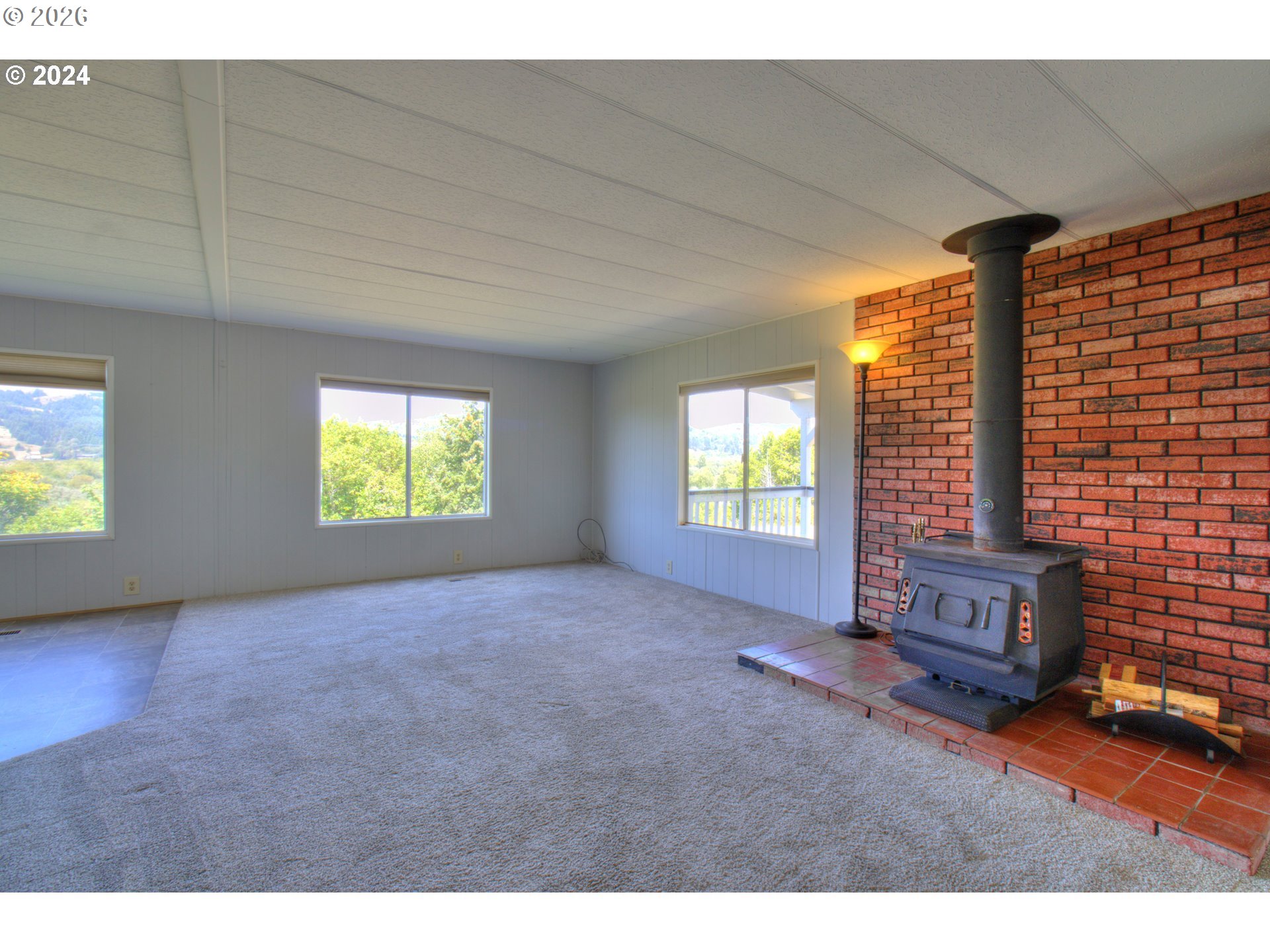 95171 Vista Loop Gold Beach, OR 97444 - Photo 4 of 35 a view of an empty room with a window
