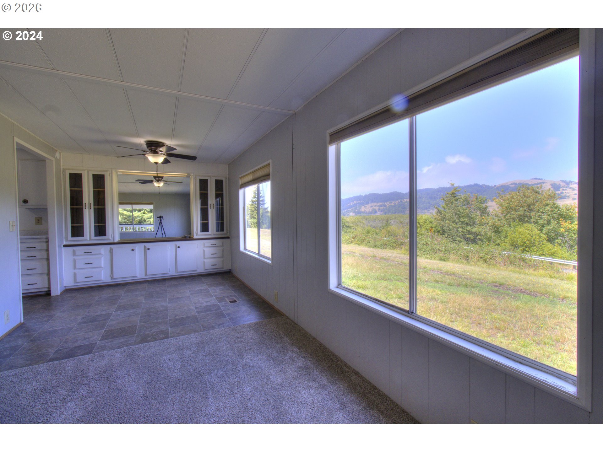95171 Vista Loop Gold Beach, OR 97444 - Photo 7 of 35 a view interior of a house window and fire place